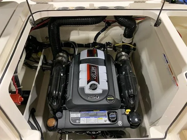 Slide: The Image of 2025 Bayliner VR6 Bowrider I/O engine compartment showcasing powerful 4.5L engine. - 9