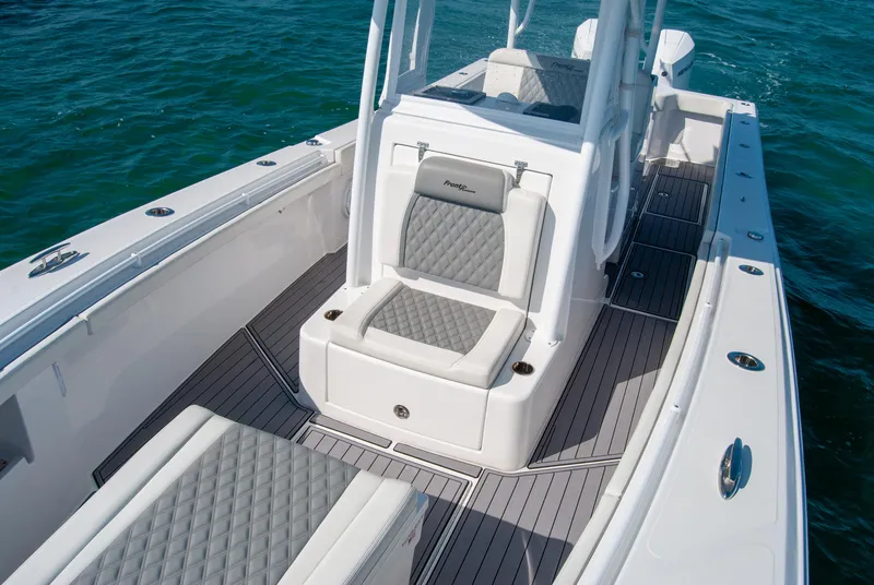 Slide: The Image of 2023 Front Runner 33 Center Console boat with sleek seating and modern design. - 16