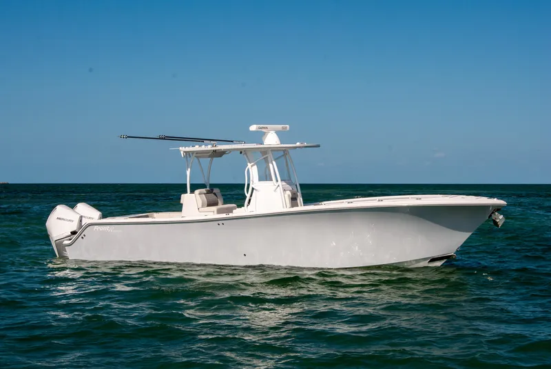 Slide: The Image of 2023 Front Runner 33 Center Console boat on open water. - 4