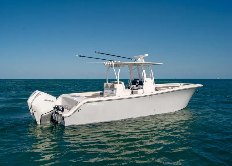 Slide: The Image of 2023 Front Runner 33 Center Console boat on open water, clear blue sky. - 5