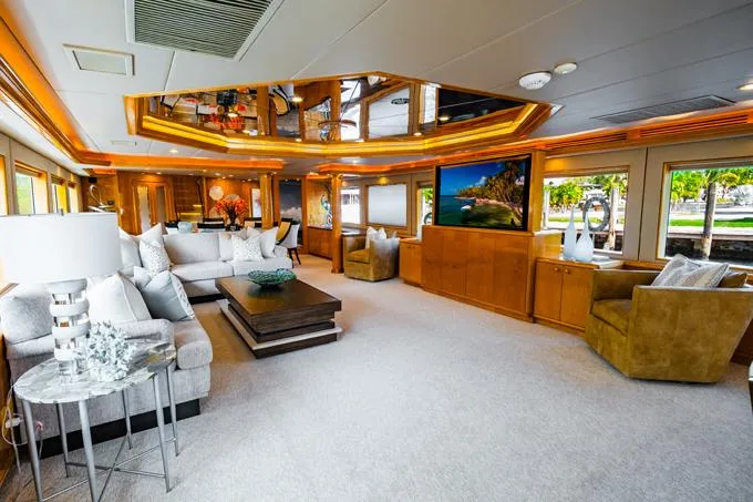Slide: The Image of Luxurious 1995 Hatteras Motor Yacht interior with elegant furnishings and modern decor. - 3