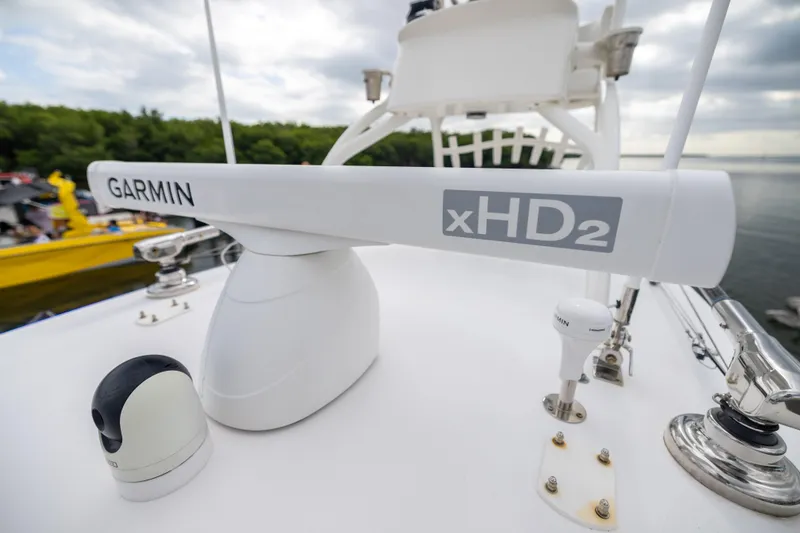 Slide: The Image of Garmin xHD2 radar on 2007 Fountain 34 Center Console boat, docked near water. - 19