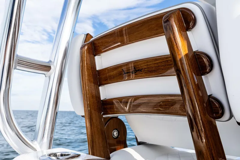 Slide: The Image of Luxurious 2025 Valhalla Boatworks V-46 with elegant wooden seating detail. - 10