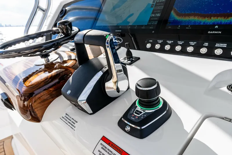 Slide: The Image of 2025 Valhalla Boatworks V-46 helm with advanced controls and navigation display. - 14