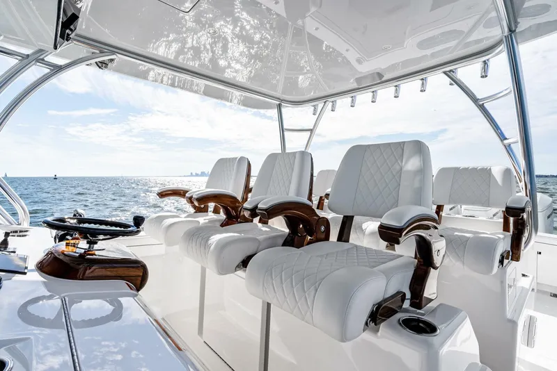 Slide: The Image of Luxurious 2025 Valhalla Boatworks V-46 interior with plush seating and ocean view. - 2