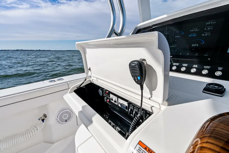 Slide: The Image of 2025 Valhalla Boatworks V-46 console with marine electronics and ocean view. - 20
