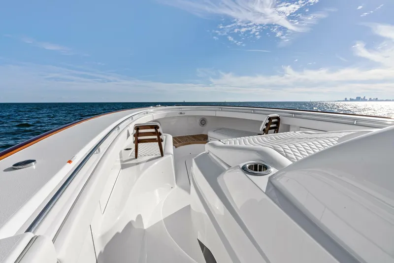 Slide: The Image of 2025 Valhalla Boatworks V-46 luxury yacht on open sea under clear sky. - 33