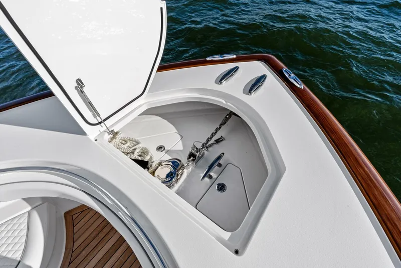 Slide: The Image of 2025 Valhalla Boatworks V-46 anchor compartment with open hatch, showcasing marine equipment. - 42