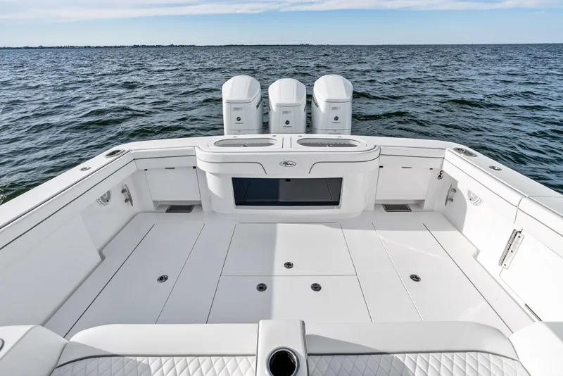 Slide: The Image of 2025 Valhalla Boatworks V-46 with triple engines on open water. - 48