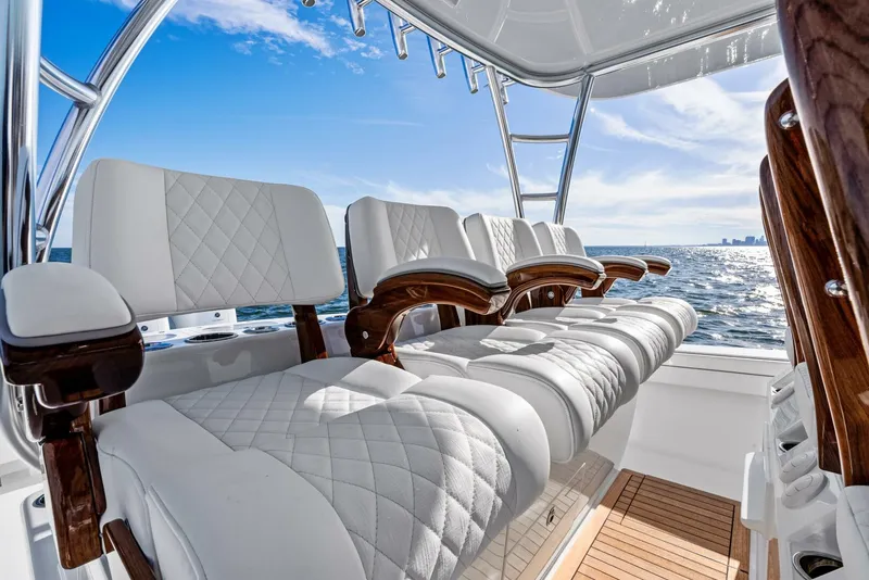 Slide: The Image of 2025 Valhalla Boatworks V-46 interior with luxurious seating on open water. - 5