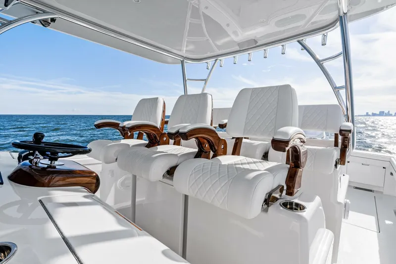 Slide: The Image of 2025 Valhalla Boatworks V-46 helm with luxurious white seating and ocean view. - 6
