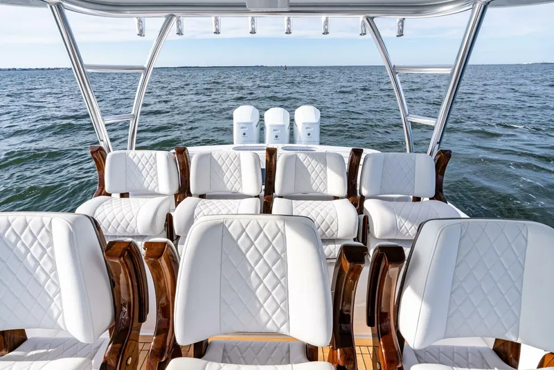 Slide: The Image of Luxurious seating on 2025 Valhalla Boatworks V-46, overlooking serene ocean waters. - 8