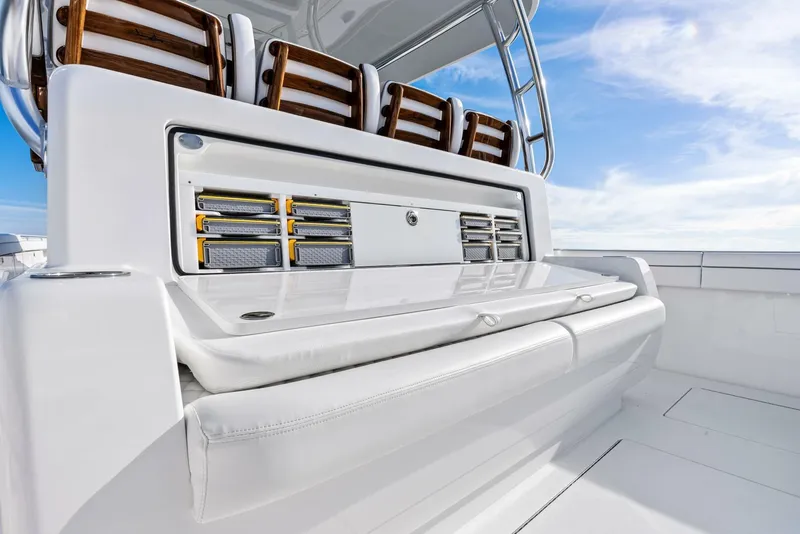 Slide: The Image of 2025 Valhalla Boatworks V-46 interior with sleek seating and storage compartments. - 9