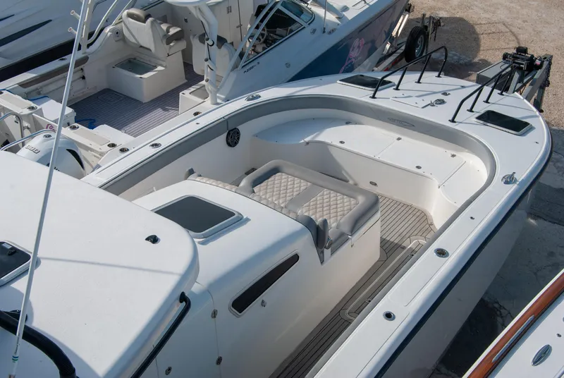 Slide: The Image of 2014 Insetta i45C boat with spacious seating and sleek design. - 5
