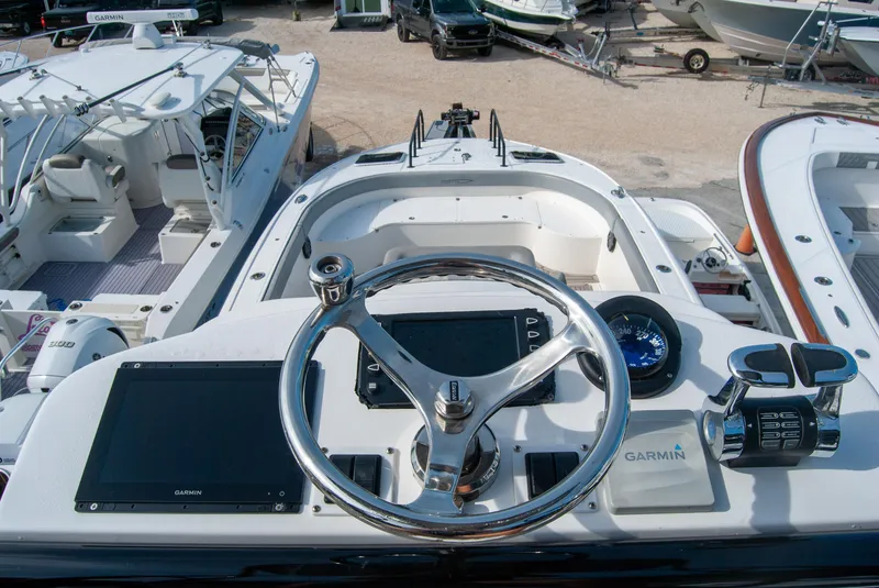 Slide: The Image of Insetta i45C 2014 boat helm with Garmin navigation system and steering wheel. - 9