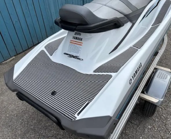 Slide: The Image of 2019 Yamaha WaveRunner VX Cruiser on trailer, parked near blue wall. - 11