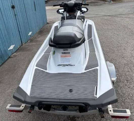 Slide: The Image of 2019 Yamaha WaveRunner VX Cruiser on trailer, parked near blue building. - 4