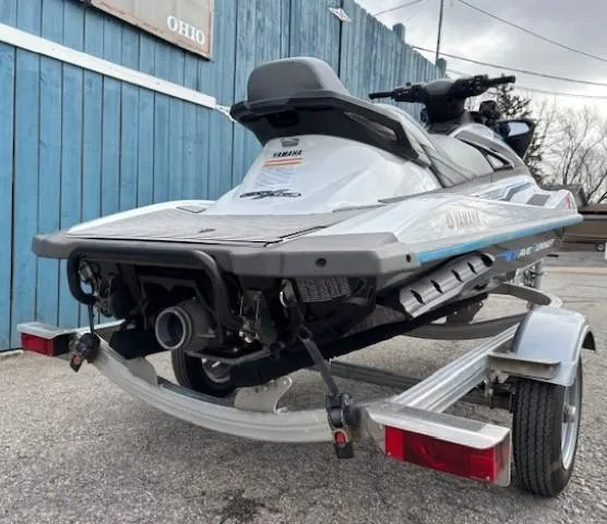 Slide: The Image of 2019 Yamaha WaveRunner VX Cruiser on trailer, parked near blue fence. - 5