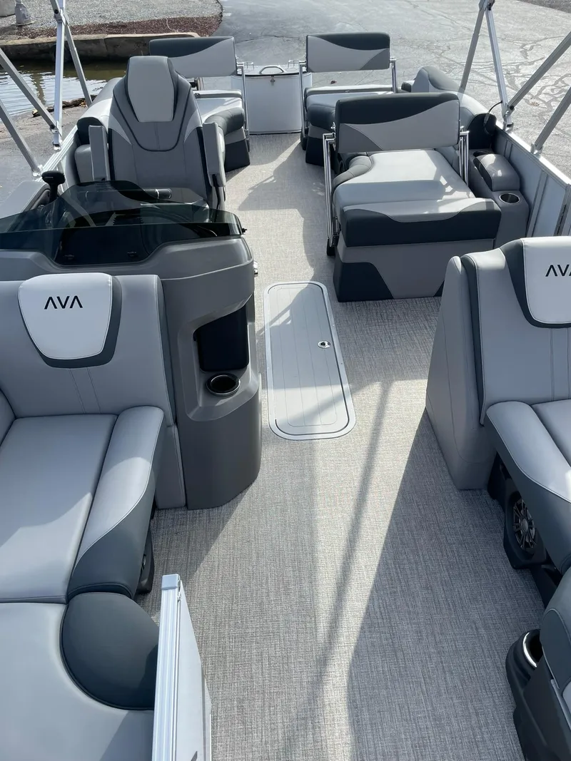 Slide: The Image of 2025 Avalon LSZ Quad Lounger Shift boat interior with gray seating and modern design. - 10