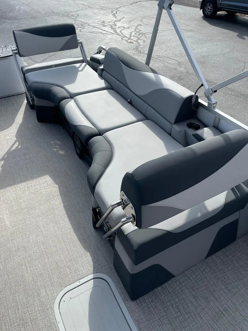 Slide: The Image of 2025 Avalon LSZ Quad Lounger Shift boat interior with gray seating and modern design. - 12