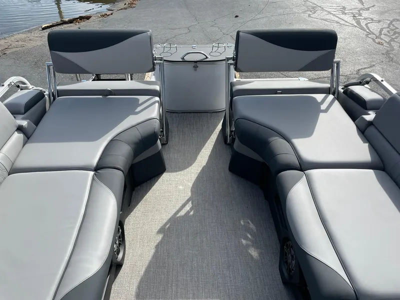Slide: The Image of 2025 Avalon LSZ Quad Lounger Shift boat interior with gray seating and modern design. - 17