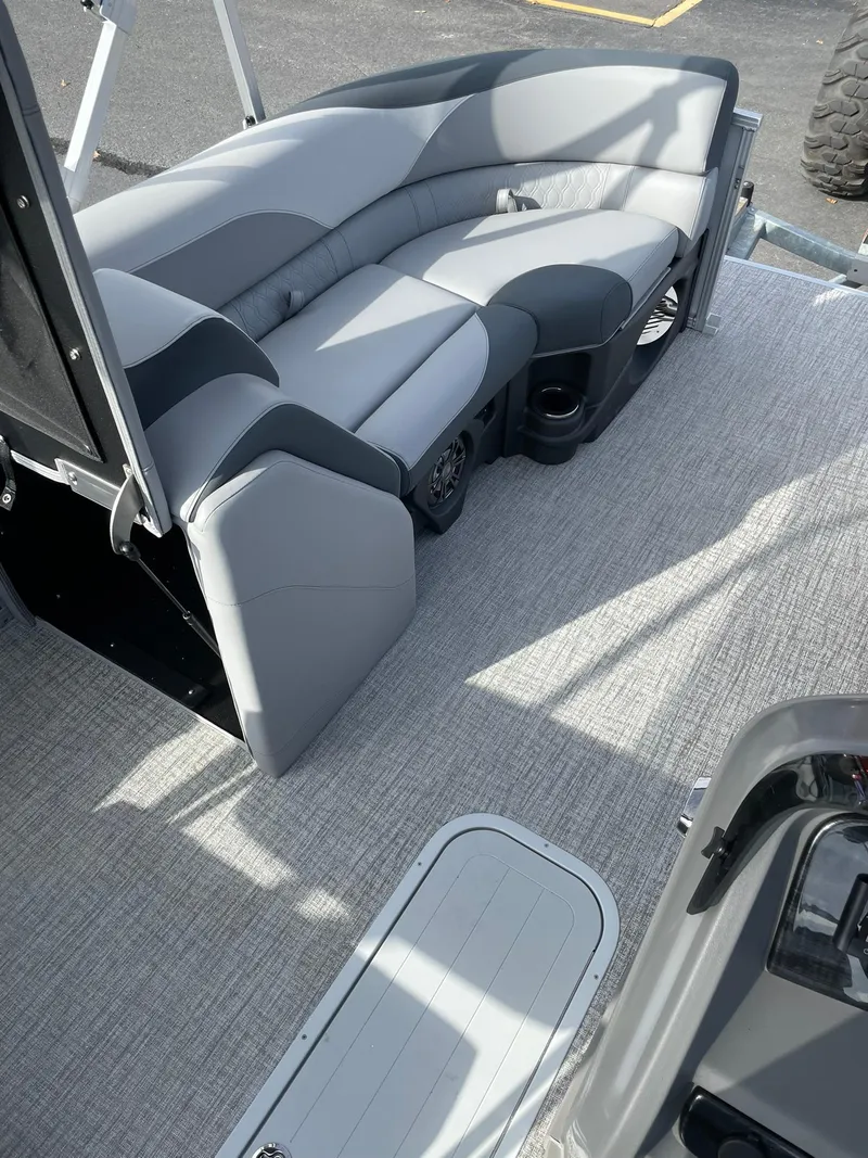 Slide: The Image of 2025 Avalon LSZ Quad Lounger Shift interior with gray seating and carpeted flooring. - 20