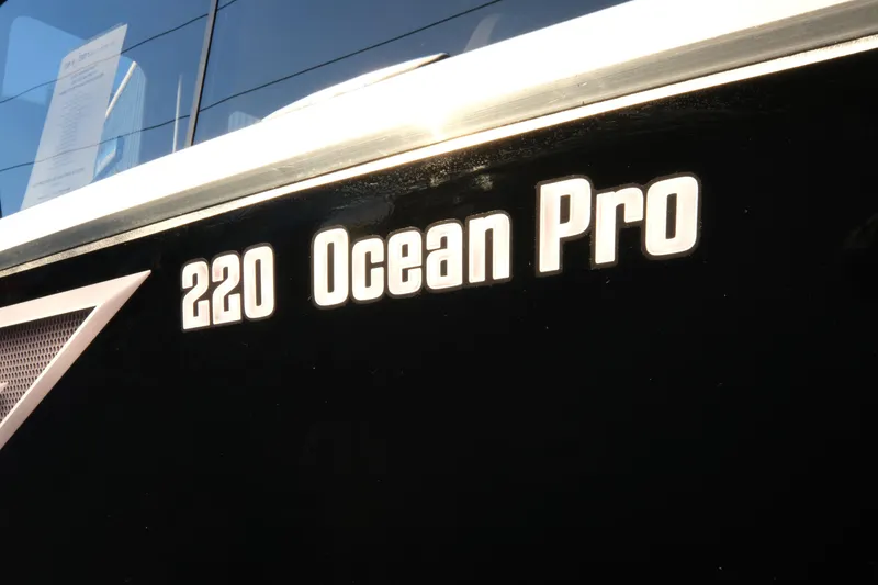 Slide: The Image of 2025 Hewescraft 220 Ocean Pro ET HT boat model name on hull. - 6