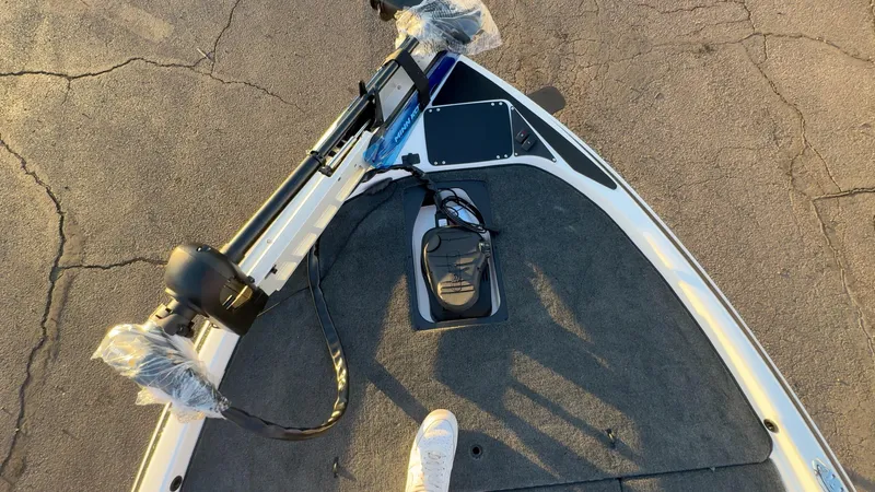 Slide: The Image of 2025 Skeeter ZX150 boat deck with fishing equipment and electronics. - 12