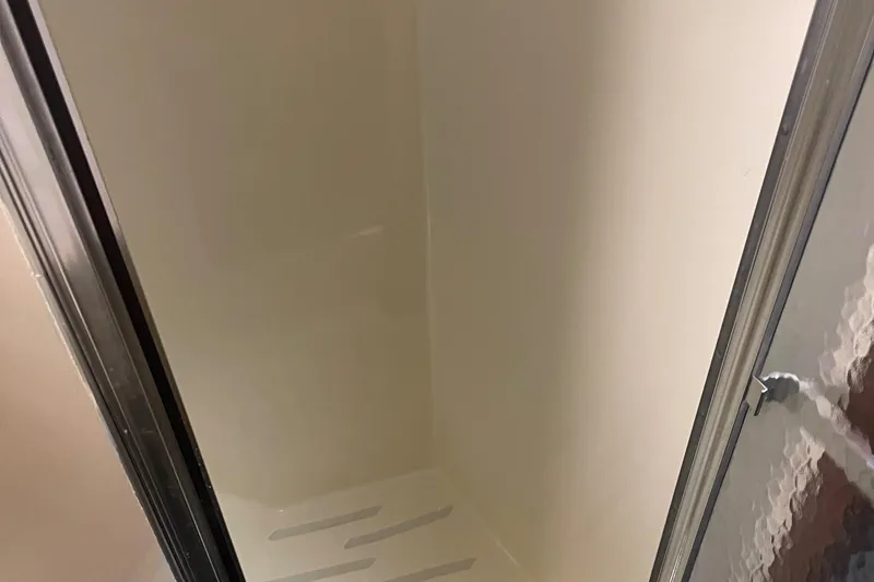 Slide: The Image of Shower stall inside 1984 Hatteras 53 Extended Deckhouse Motor Yacht. - 31