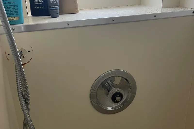 Slide: The Image of Shower area in 1984 Hatteras 53 Extended Deckhouse Motor Yacht with toiletries. - 32