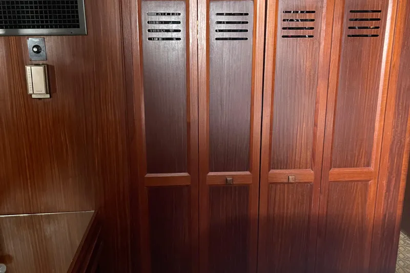 Slide: The Image of Wooden interior of 1984 Hatteras 53 Extended Deckhouse Motor Yacht, featuring elegant cabinetry. - 35
