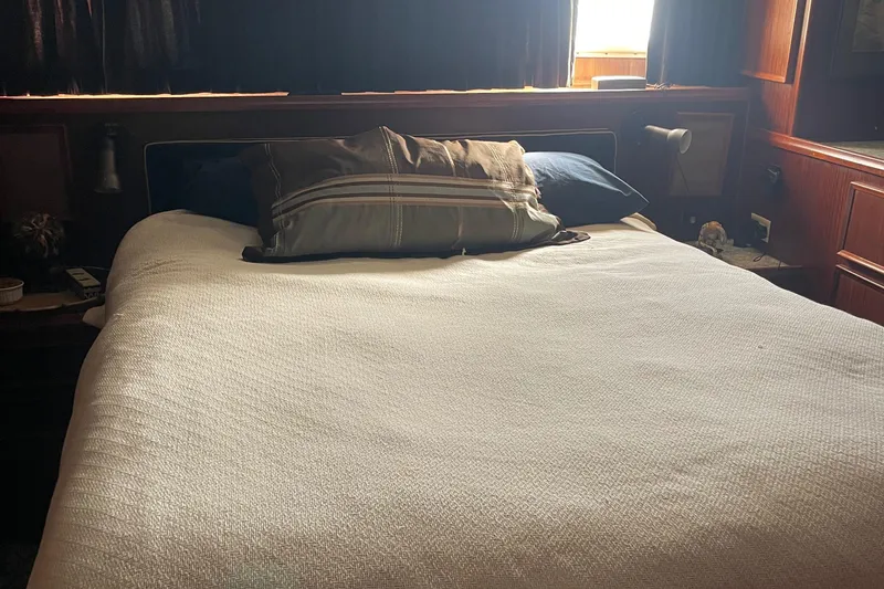 Slide: The Image of Cozy bedroom in 1984 Hatteras 53 Extended Deckhouse Motor Yacht with natural light. - 37