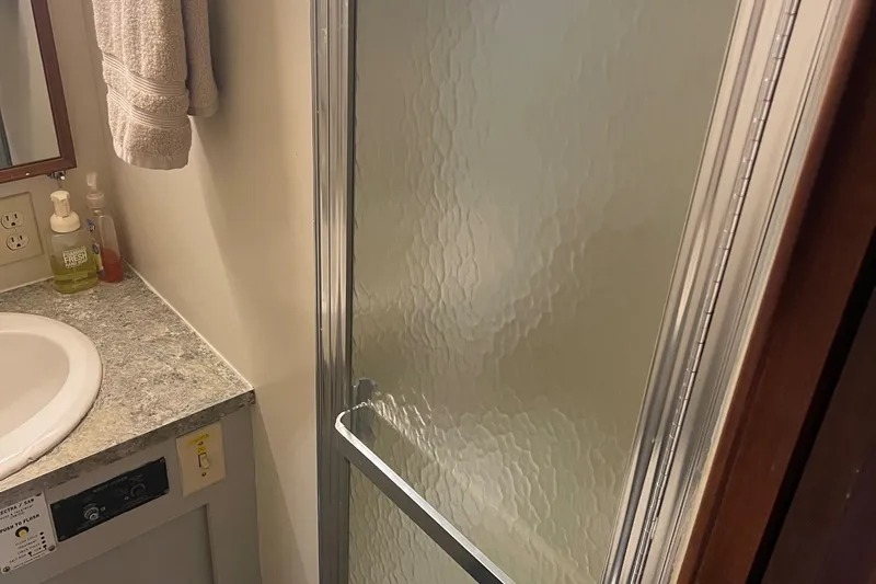 Slide: The Image of Bathroom with shower in 1984 Hatteras 53 Extended Deckhouse Motor Yacht. - 41