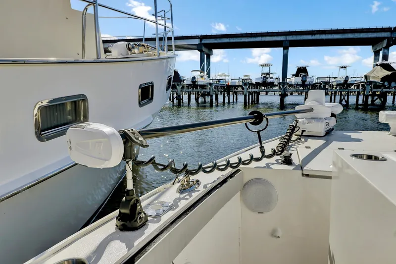 Slide: The Image of 2024 Custom Nerowalker boat docked near a bridge, showcasing modern design and equipment. - 18