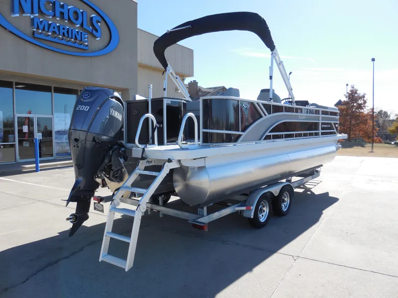 Slide: The Image of 2025 Bennington 23 SS pontoon boat with Yamaha engine at Nichols Marine dealership. - 3