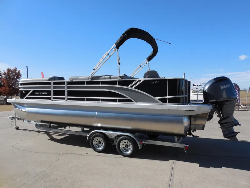 Slide: The Image of 2025 Bennington 23 SS pontoon boat on trailer, side view. - 4