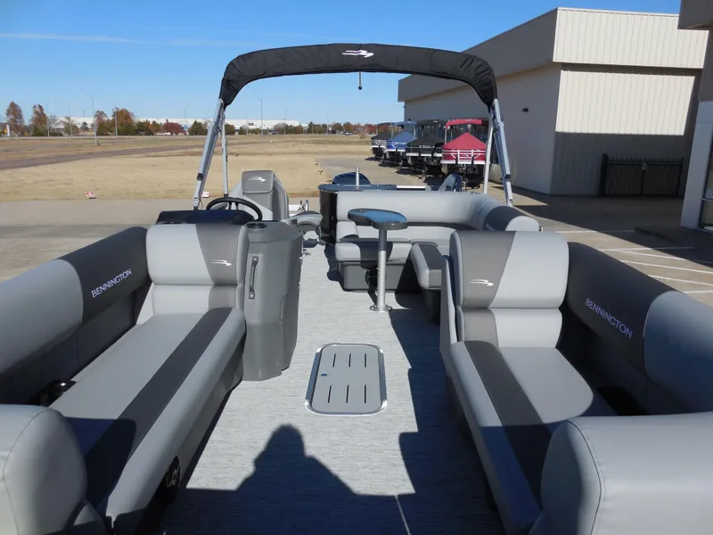Slide: The Image of 2025 Bennington 23 SS pontoon boat with spacious seating and modern design. - 5