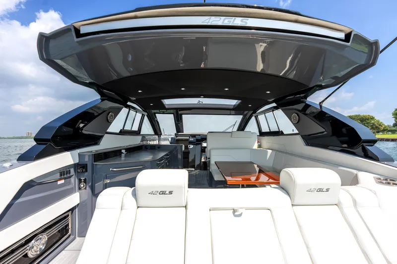 Slide: The Image of 2023 Cruisers Yachts 42 GLS OB interior with luxurious seating and sleek design. - 40