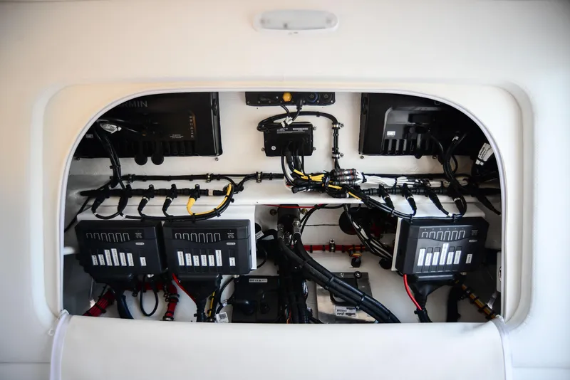 Slide: The Image of 2025 Nor-Tech 340 boat electrical system with wiring and control panels. - 29