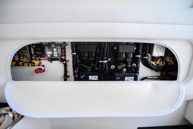 Slide: The Image of 2025 Nor-Tech 340 boat electrical panel with wiring and components. - 30