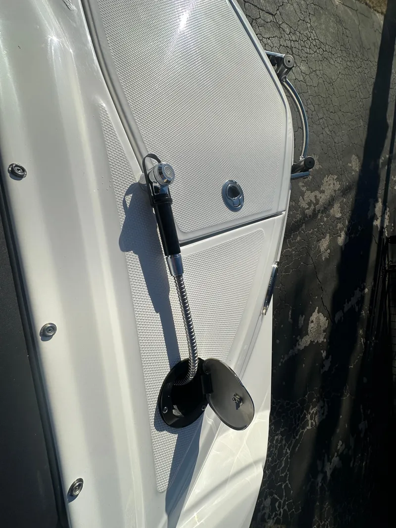 Slide: The Image of 2025 Monterey M-45 boat detail with sleek white panel and chrome fittings. - 15