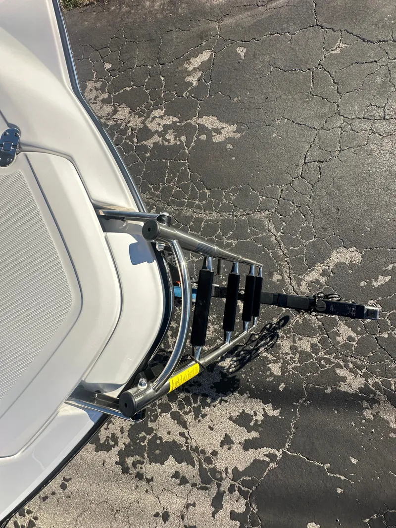 Slide: The Image of Boat ladder on a 2025 Monterey M-45, resting on cracked pavement. - 17