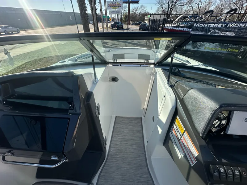 Slide: The Image of 2025 Monterey M-45 boat interior with modern dashboard and seating. - 34