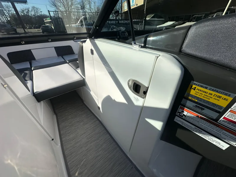 Slide: The Image of 2025 Monterey M-45 boat interior with seating and capacity label. - 35