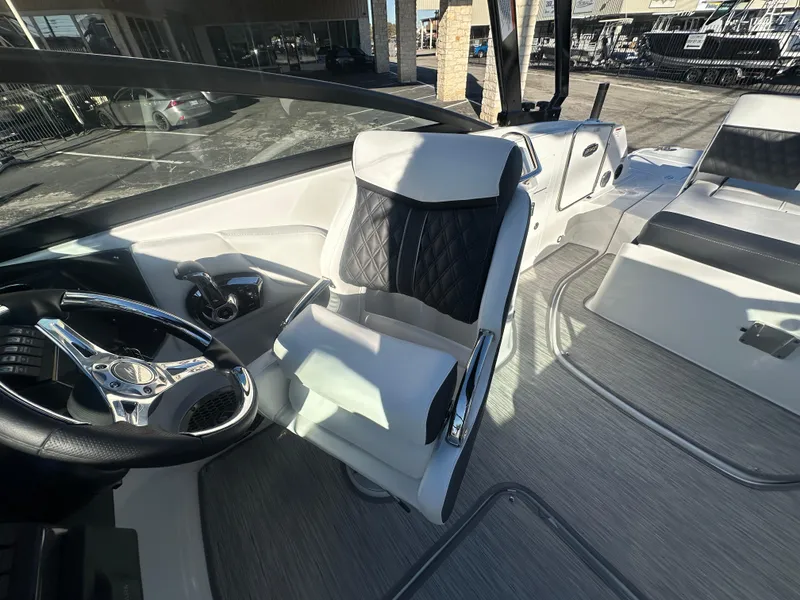 Slide: The Image of Luxury interior of 2025 Monterey M-45 boat with sleek steering and comfortable seating. - 38
