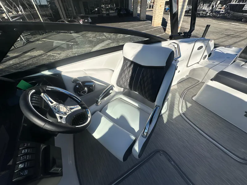 Slide: The Image of Cockpit of 2025 Monterey M-45 boat with modern steering and seating. - 39