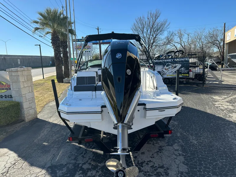 Slide: The Image of 2025 Monterey M-45 boat on trailer, parked outdoors, rear view. - 4
