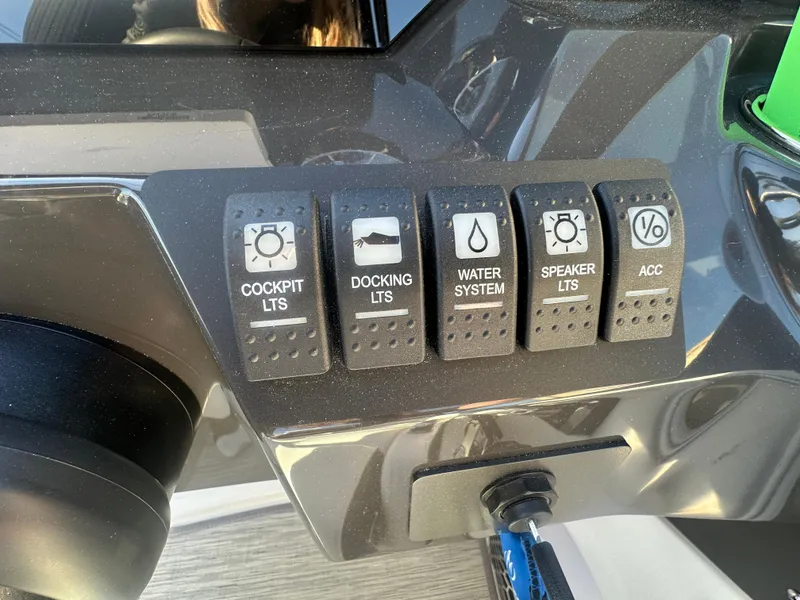 Slide: The Image of Control panel of a 2025 Monterey M-45 boat with labeled switches. - 41