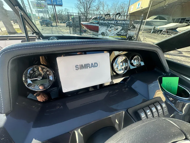 Slide: The Image of Dashboard of 2025 Monterey M-45 boat with Simrad display and gauges. - 42
