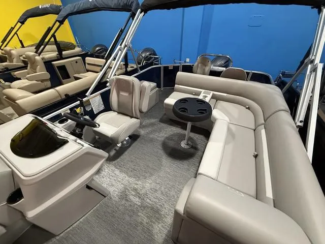 Slide: The Image of 2025 Godfrey Pontoons Xperience 2286 FSX interior with plush seating and steering console. - 10